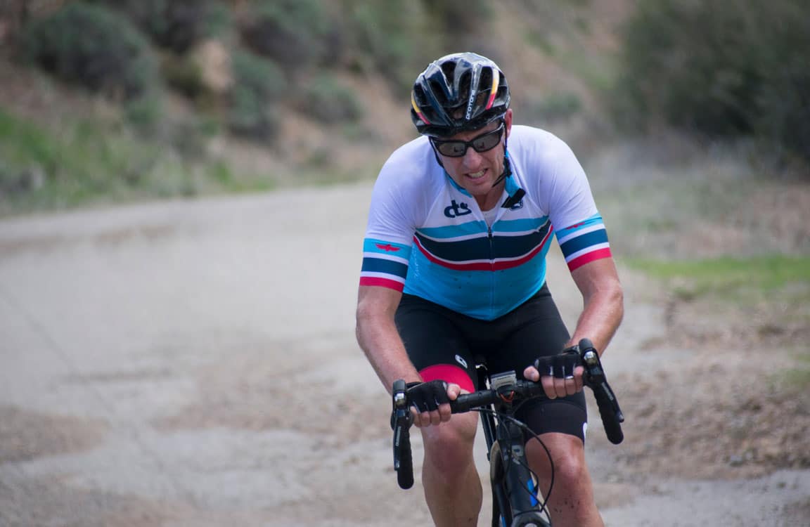 cyclist riding hard