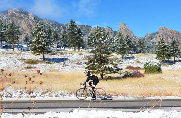 cyclist riding in snow