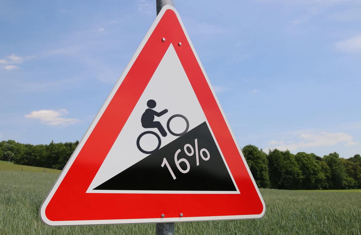 fat cyclist uphill