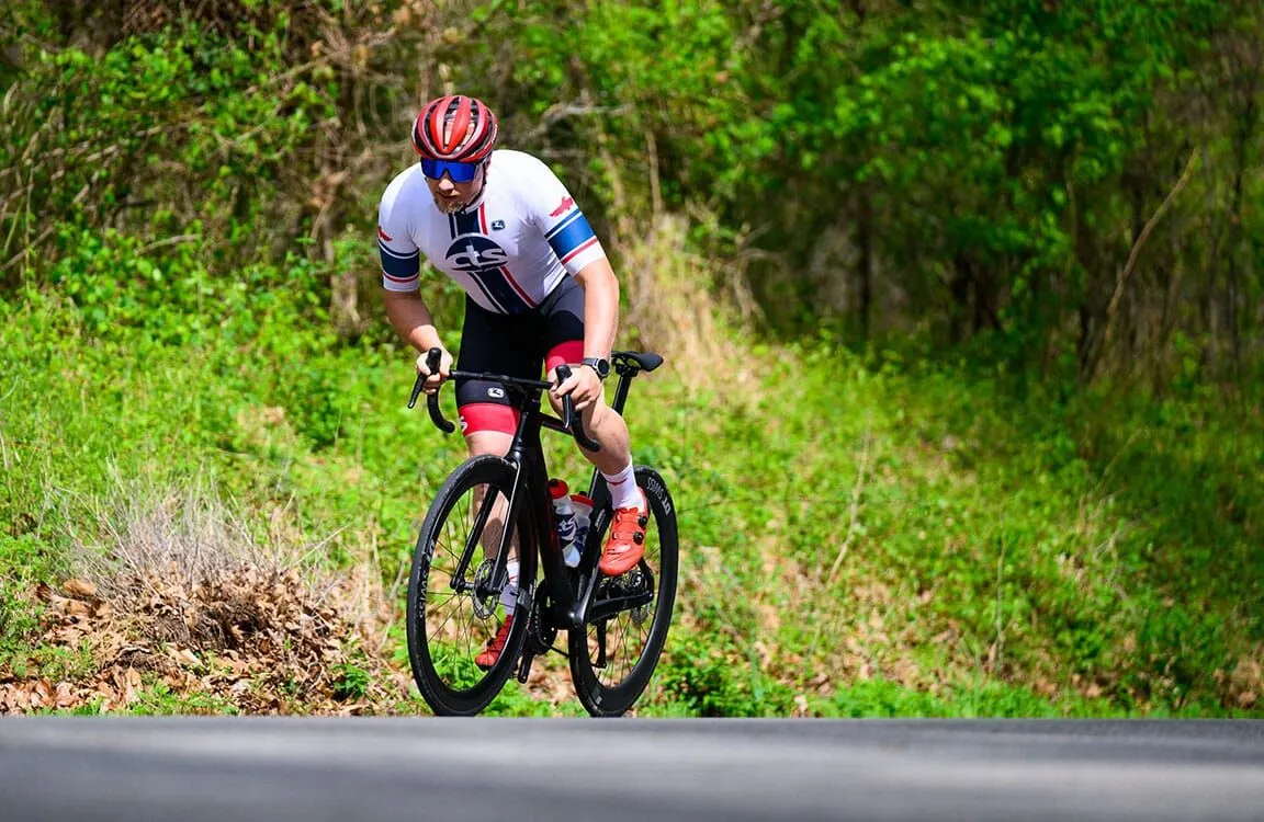 male road cyclist sprinting