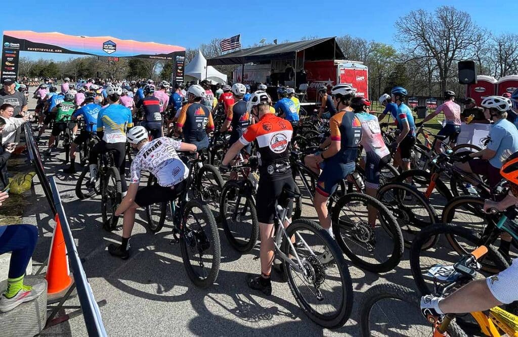 How to Get Kids Into Cycling and Junior Bike Racing 2 young bike racers at start line