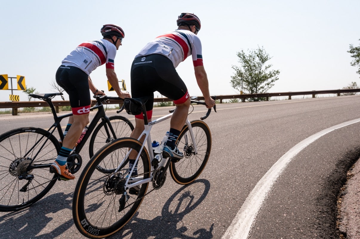 Cyclists Seated and Standing Climbing Mechanics to Ride Uphill