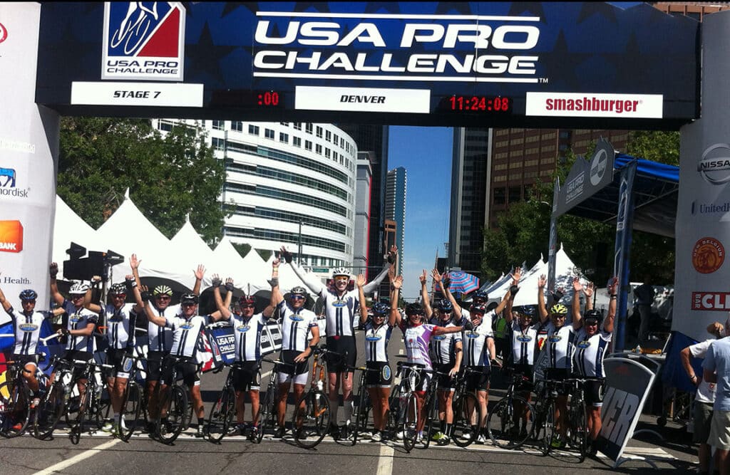 Bill Walton with CTS Athletes at the finish of the 2013 USA Pro Challenge Experience.