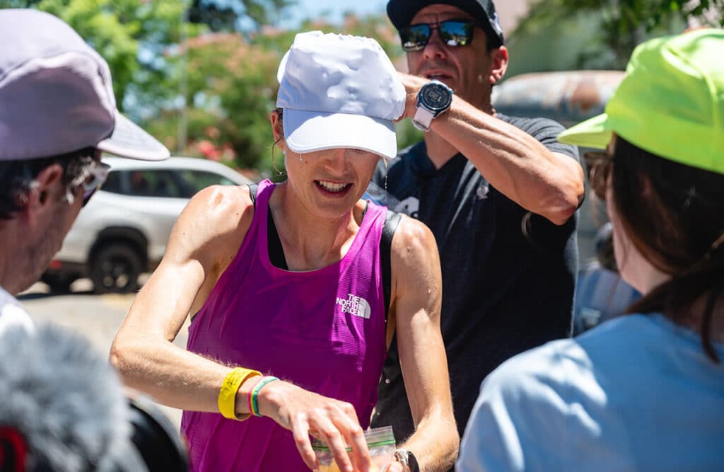 Katie Schide at aid station during WSER