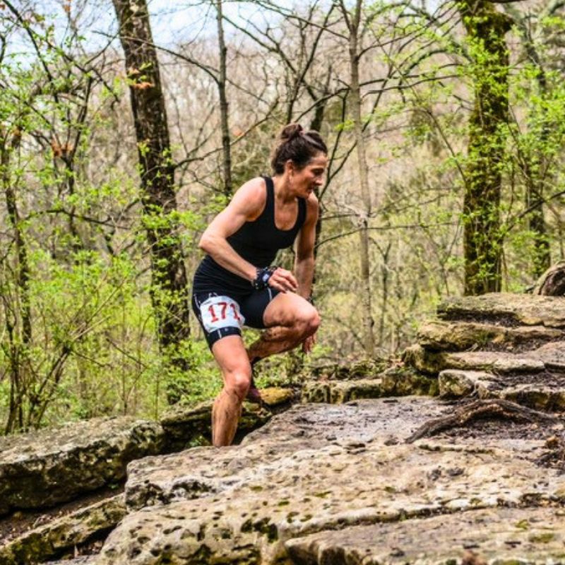 Molly Schmelzle ultrarunning in forest